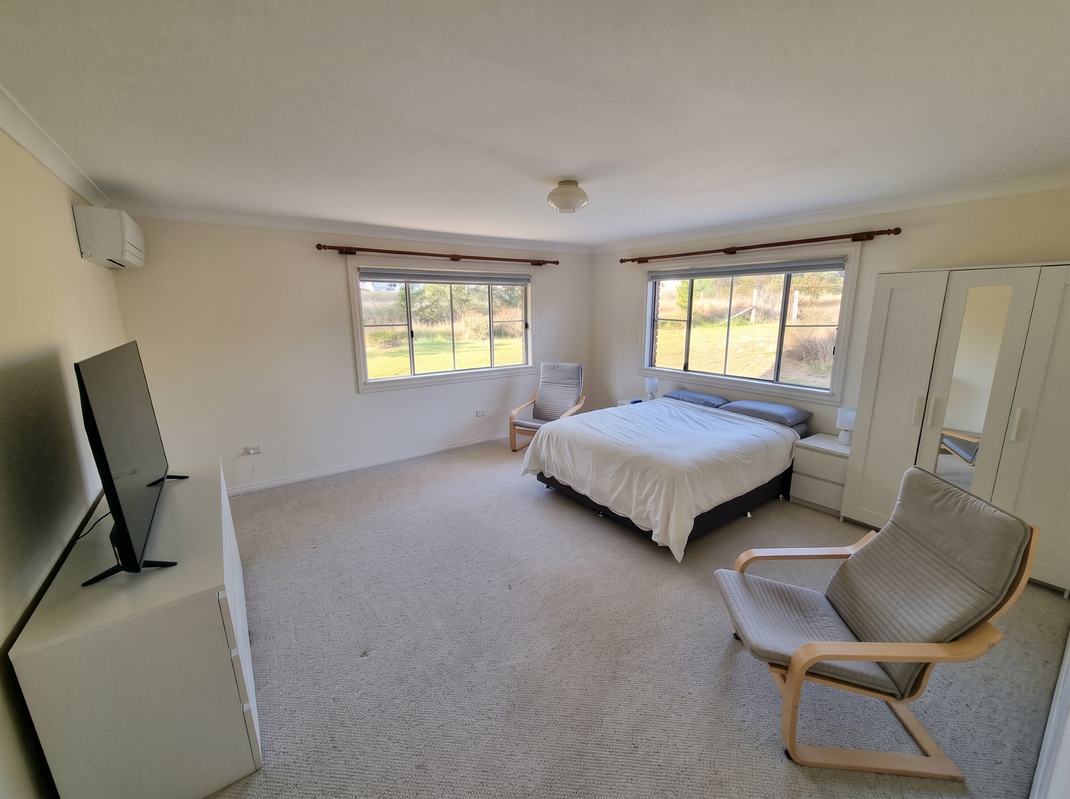 Private furnished bedroom with living space